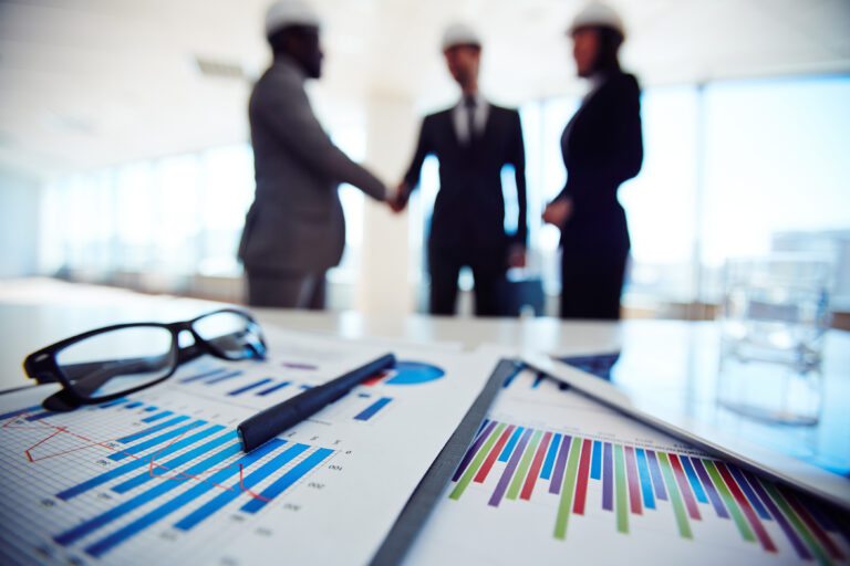 Competitive advantage: How Competitive Advantage Separates Leaders from the Rest 1 business objects with executives discussing blueprint meeting